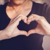 woman-making-hands-heart-shape-sign-health-insurance-donation-volunteer-concept_49149-1355